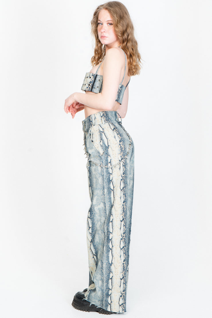 Wide legged snake print trousers out of blue denim from IVY Berlin