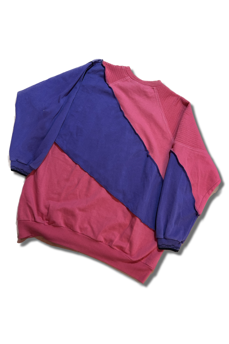 Pink and purple slash pattern sweater.