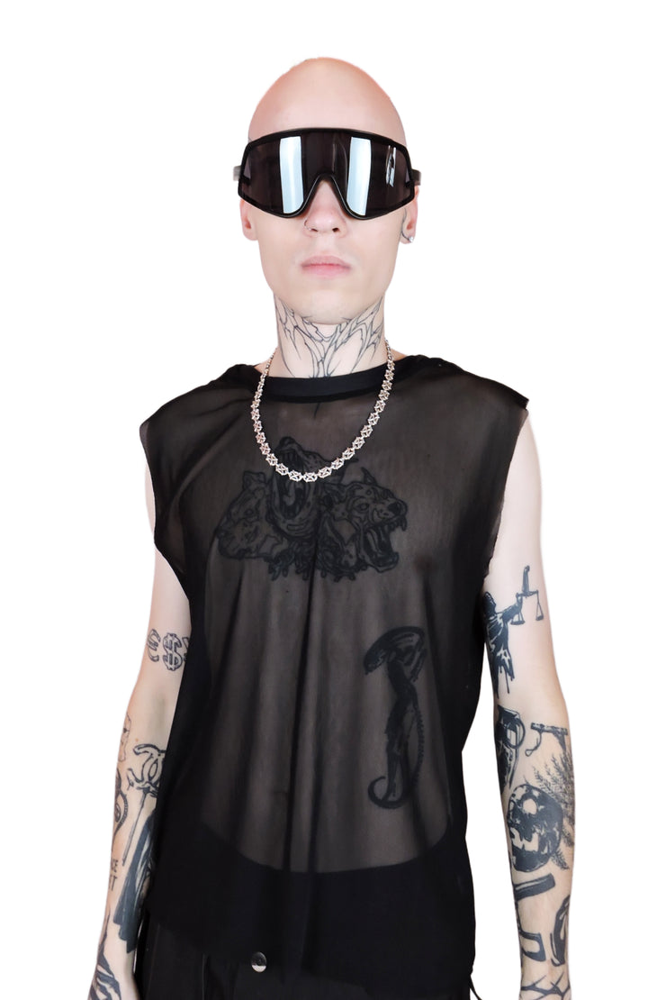 Oversized black futuristic sunglasses with bold angular frames and sleek black lenses from the front. For men or women.