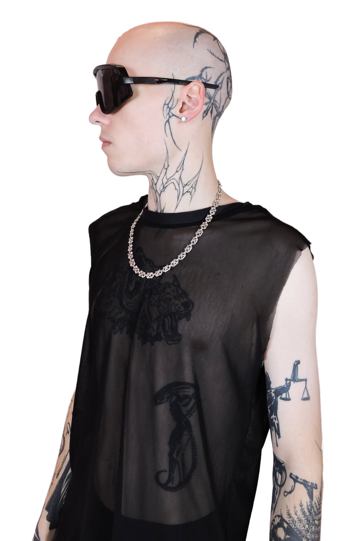 Oversized black futuristic sunglasses with bold angular frames and sleek black lenses from the side. For men or women.