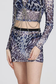 Light blue cheetah-print mesh longsleeve top on a white background, featuring a fitted silhouette and sheer stretch fabric.