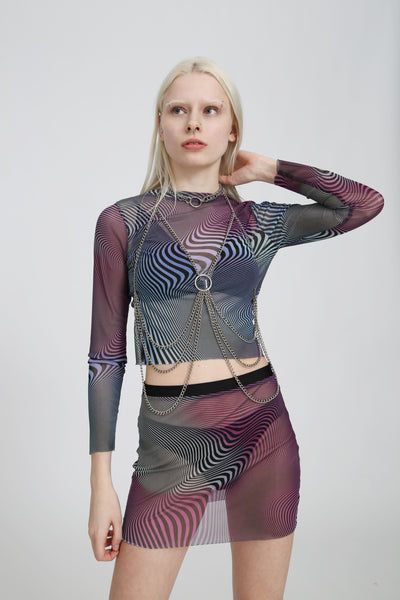 Mesh longsleeve top in a purple, blue, pink, and black abstract print on a white background, fitted and sheer with stretchy fabric.