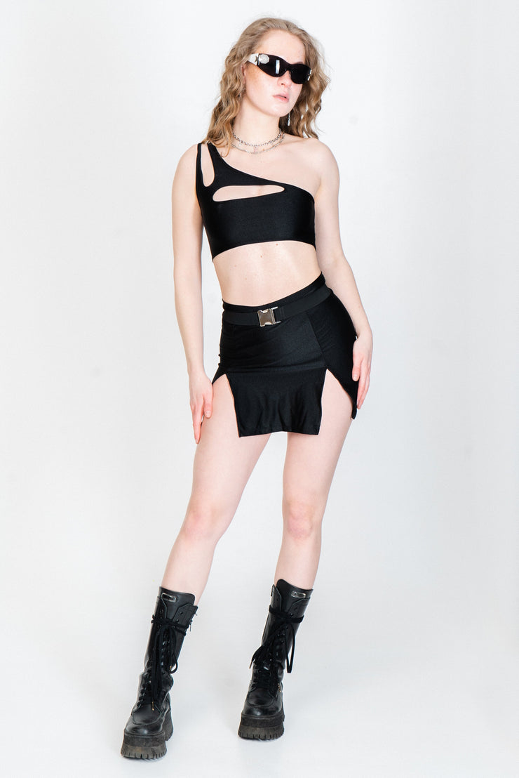 Sleek black mini skirt with high slits and a silver belt buckle.