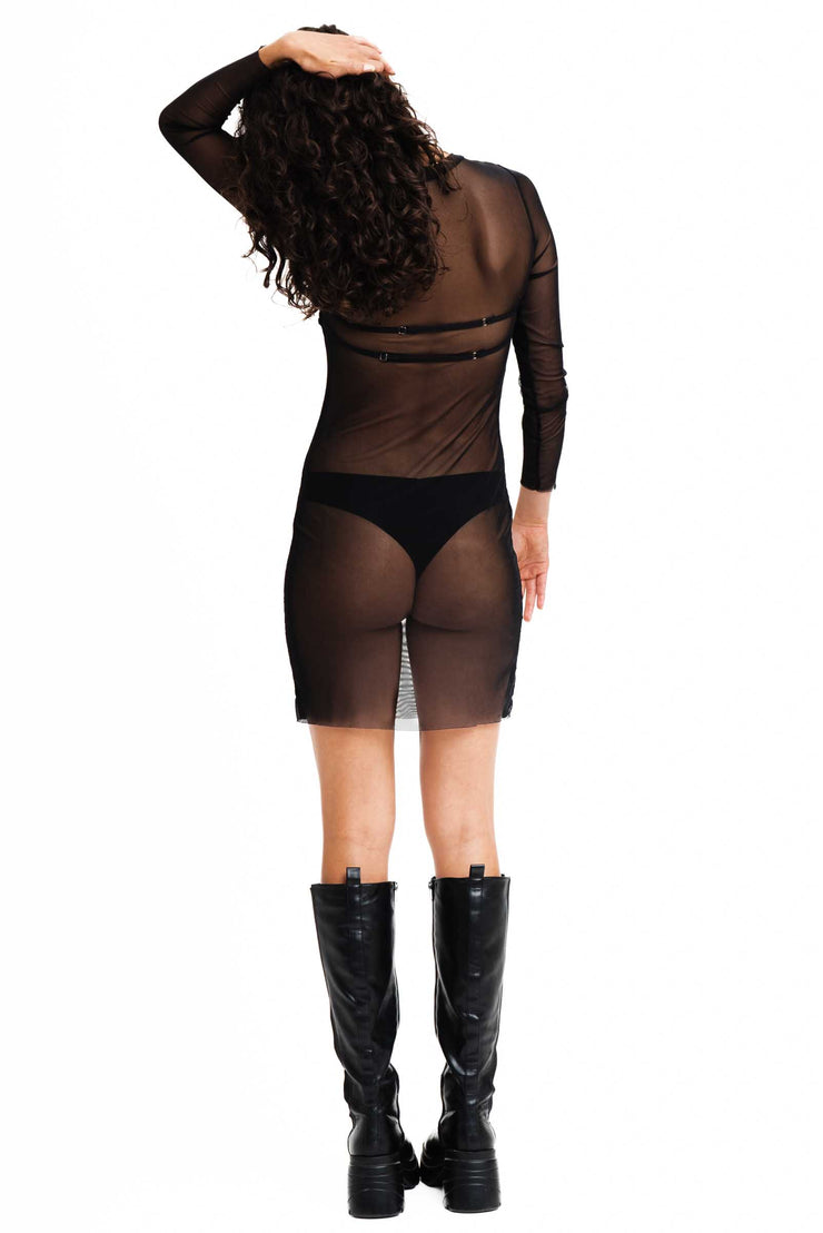 Black see through mesh mini dress with belted top detail.