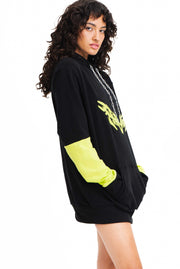 Black and neon green sweatshirt with a tribal print.