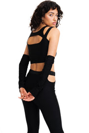 Layered black top with matching sleeves for raves.