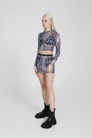 Light blue cheetah-print mesh top on a white background, fitted silhouette with sheer stretchy fabric.