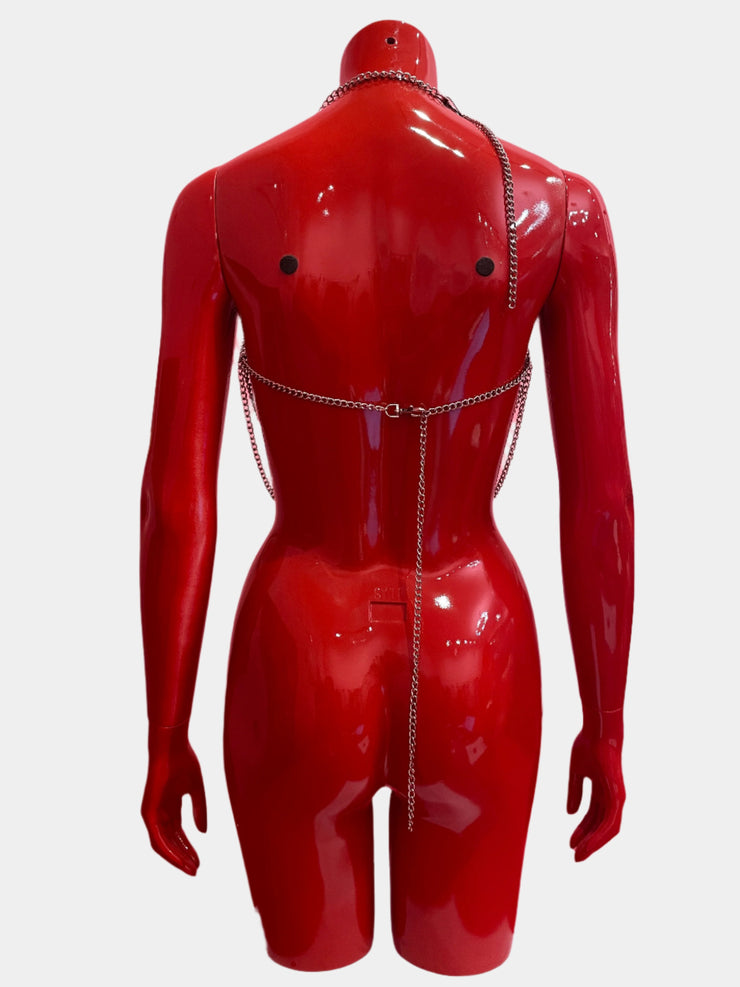 A unisex silver chain harness with a layered design, perfect for adding a striking, edgy touch to any outfit, shown from the back.