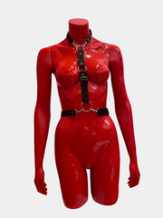 A black adjustable harness for men or women, featuring sleek straps and a versatile design for a bold and stylish look.