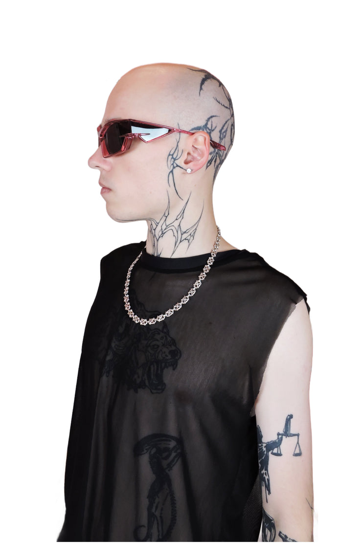 Transparent pink sunglasses with bold, reflective lenses and sleek, modern frame from the side. For men or women.