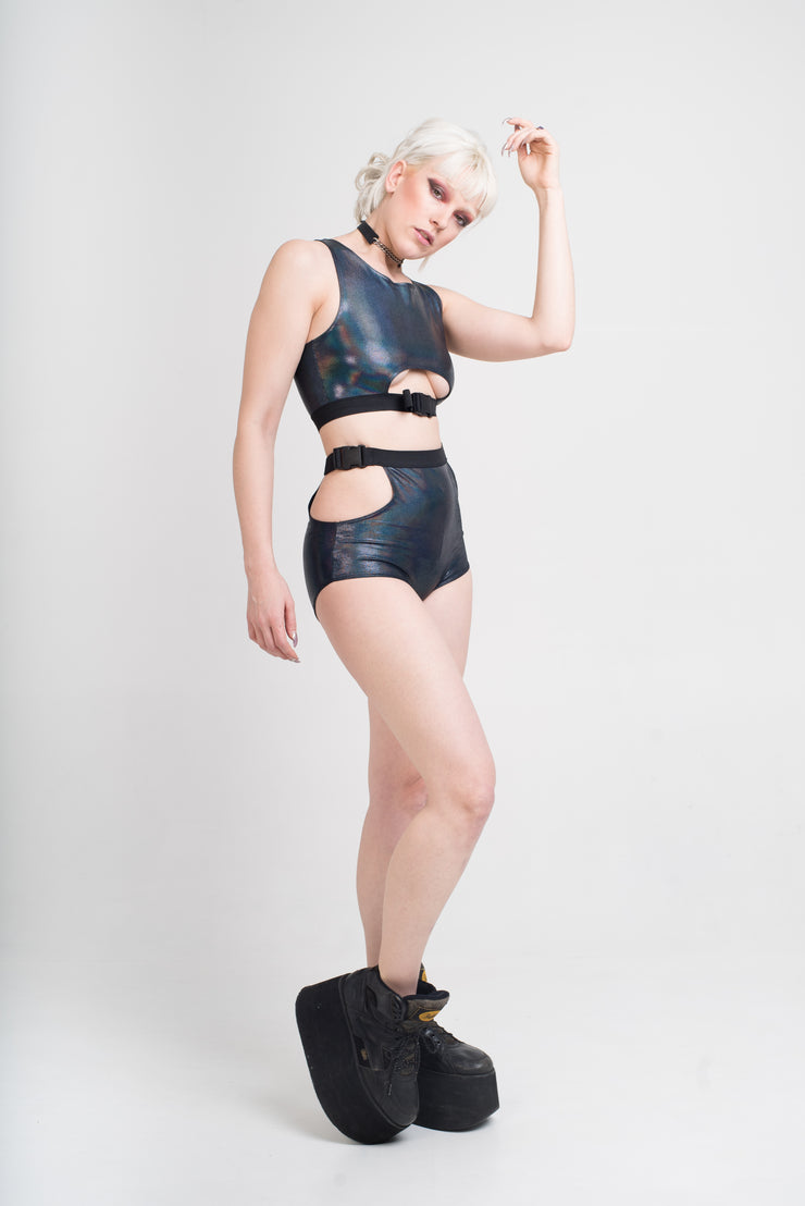 Black holographic crop top with an underboob cutout and buckle detail.