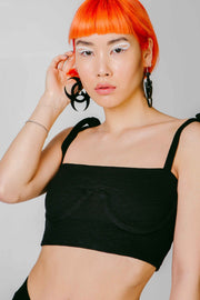 black adjustable top and toxic symbol earrings