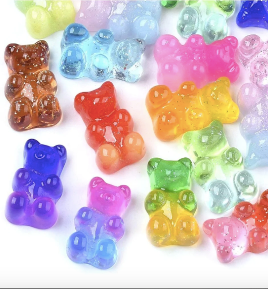 Colorful gummy bear shaped earring.