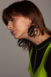 Black dragon shaped statement earrings.