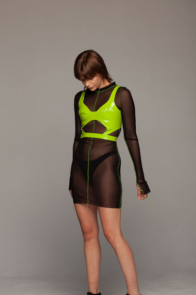 See through black mesh dress sewn with neon green seams.