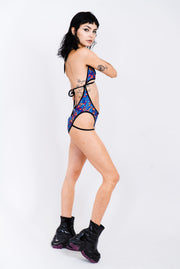 Blue and red lava print strappy bodysuit with underboob cutout.