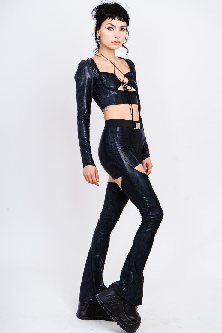 Black snake layered leggings with cutouts.