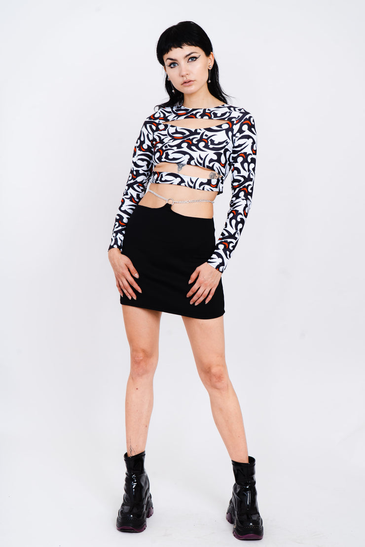 Black, white, and red tribal print layered top.