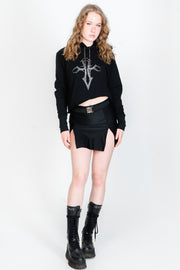 Black cropped sweatshirt with silver rhinestone cross print.