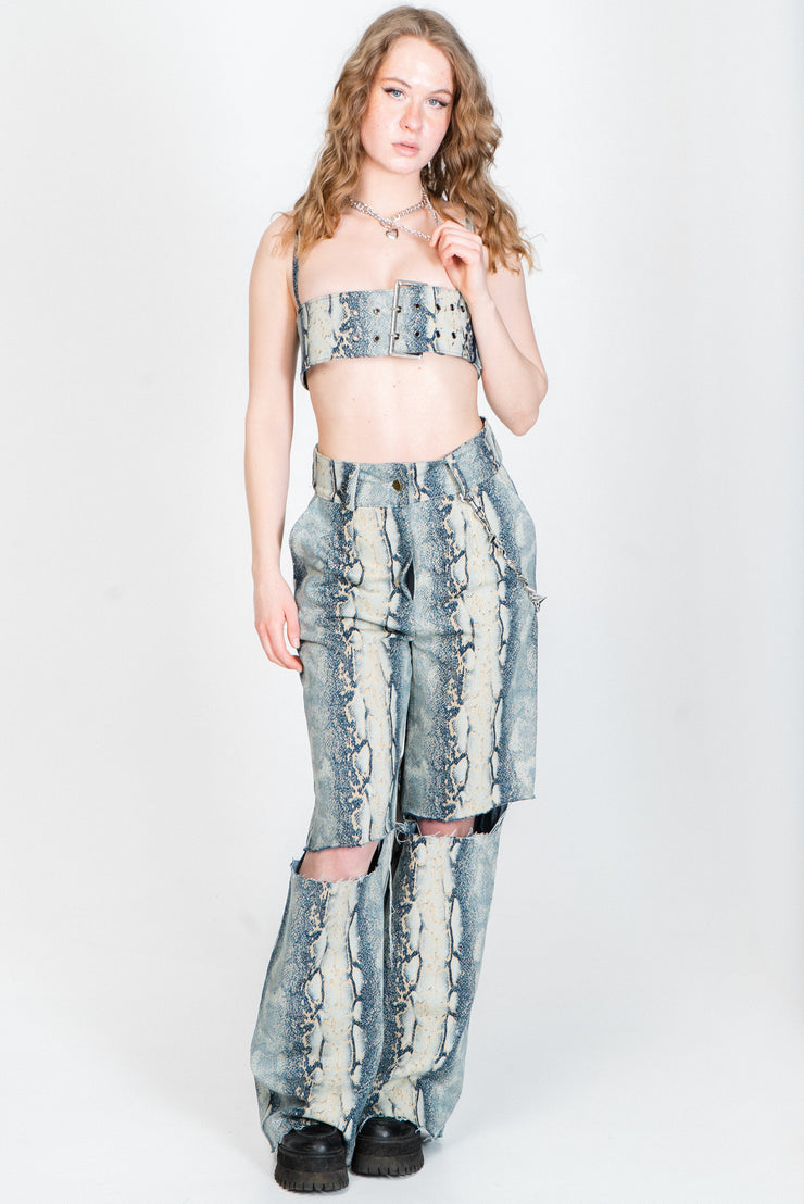 Wide legged snake print trousers out of blue denim from IVY Berlin