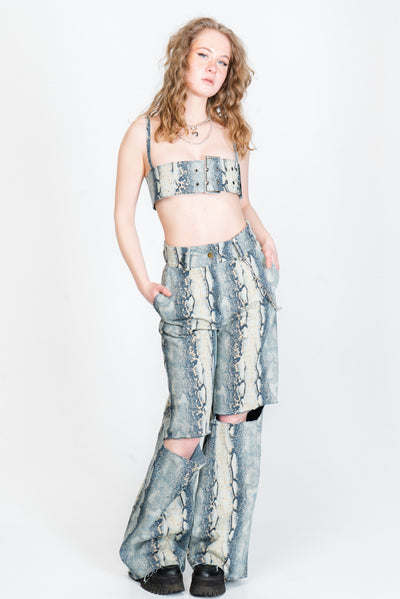 Wide legged snake print trousers out of blue denim from IVY Berlin