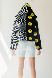 half zebra pattern and half smiley face faux fur crop jacket