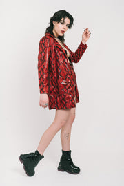 Cherry red snake skin blazer out of a shiny fabric made by IVY Berlin