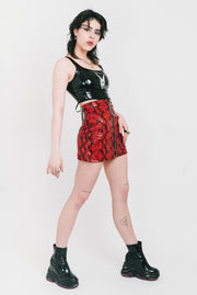 Cherry red snake skin skirt with silver o ring made by IVY Berlin