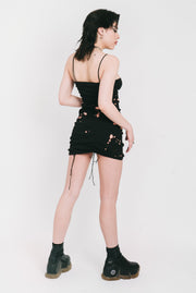 Bleached black mini dress with gathers in the front and back. 