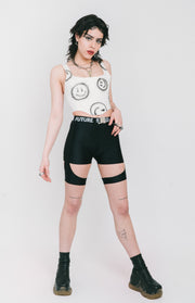 White corset with black smiley face print from IVY Berlin