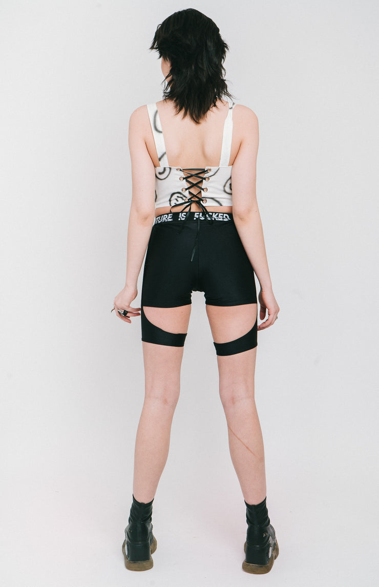 Layered strappy shorts in the "Lara Croft" style made out of black fabric