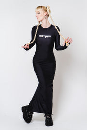 Floor length tight black dress with "Dirtbag" print in silver.