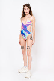 Strappy bodysuit out of pink and blue rainbow fabric. 