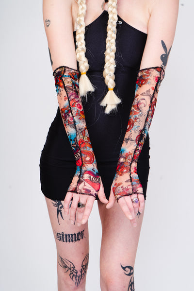 Tattoo print sleeves in an Ed Hardy Style.