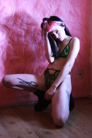 Neon green and black snake print lingerie (bra and thong).