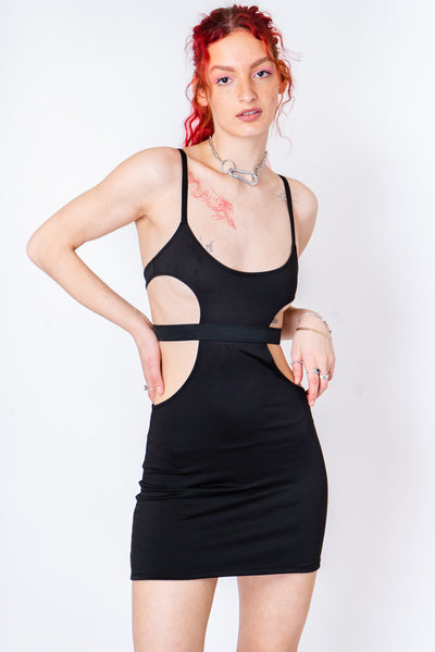 Black mini dress with underboob cutouts and spaghetti straps.