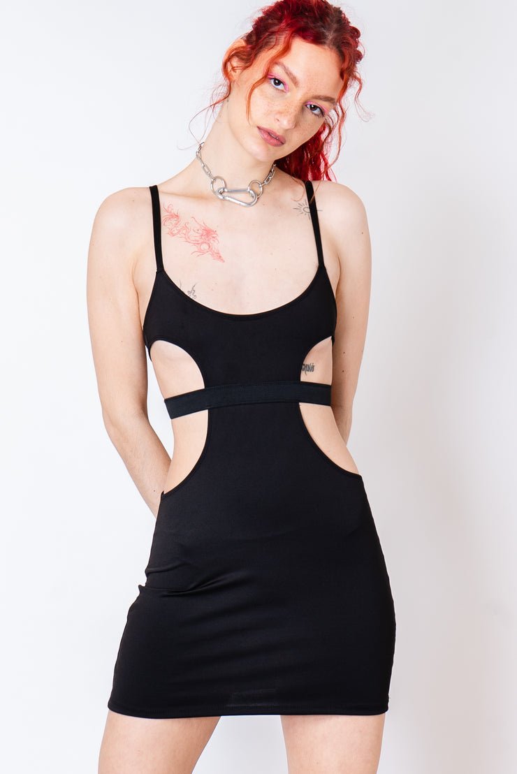 Black mini dress with underboob cutouts and spaghetti straps.