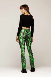 Neon green and black snake print flare leggings.