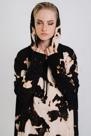 Black and white oversized bleached hoodie in a grunge style.