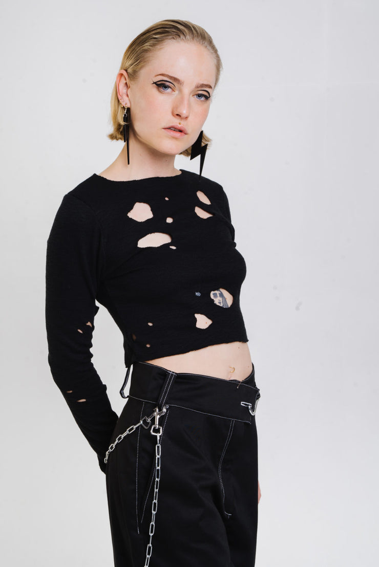 Distressed black longsleeve top with irregular holes from Berlin