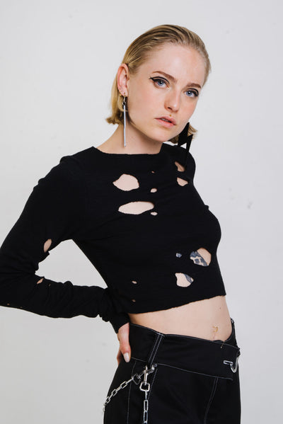 Distressed black longsleeve top with irregular holes from Berlin